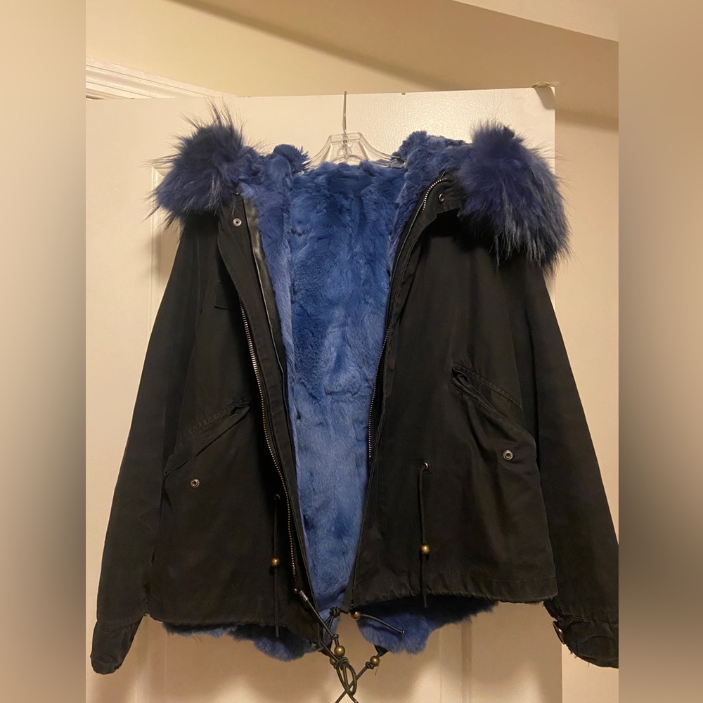Black coat with blue fur